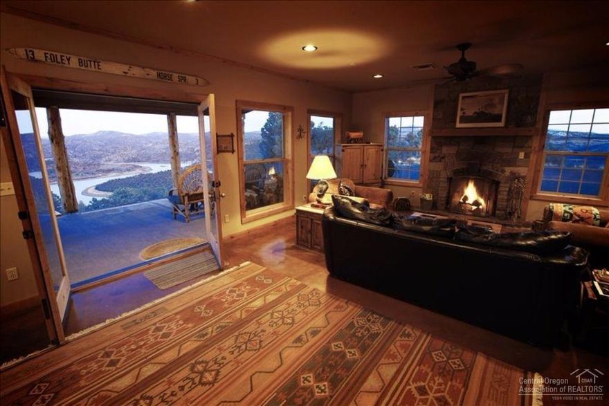 Spectacular Crooked River and Prineville Lake views, 20.56 acres bordered by BLM on 3 sides. Rustic 3 bed/2 bath, open floor plan, timeless finishes including Juniper posts, knotty alder, rock fireplace, cherry wood flooring, river rock shower floor. Venture off the patio to a jetted spa under the brightest stars. Close to store, marina and State Parks. Drone video and vacation rental income history (5-star ratings from guest clientele and comments) are available upon request.