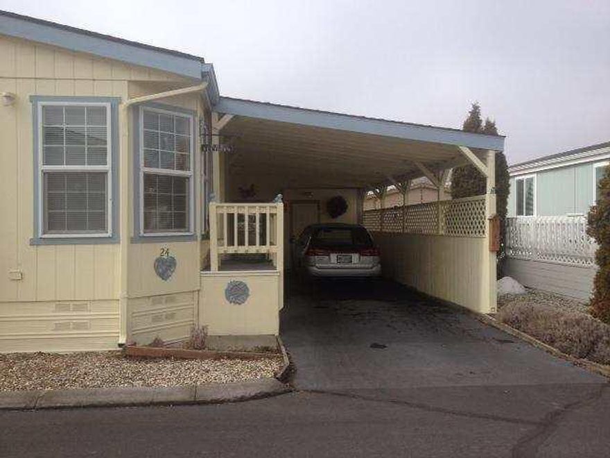 Beautiful Home With Lots Of Extras. Private Fenced Yard, Covered Deck, Nice Carport, Oversized Shower, Handi Cap Accessable. 55+ Park. Space Rent $319 Month Includes Water, Garbage & Sewer. Park Manager Must Approve Buyer. Possible Owner Carry.