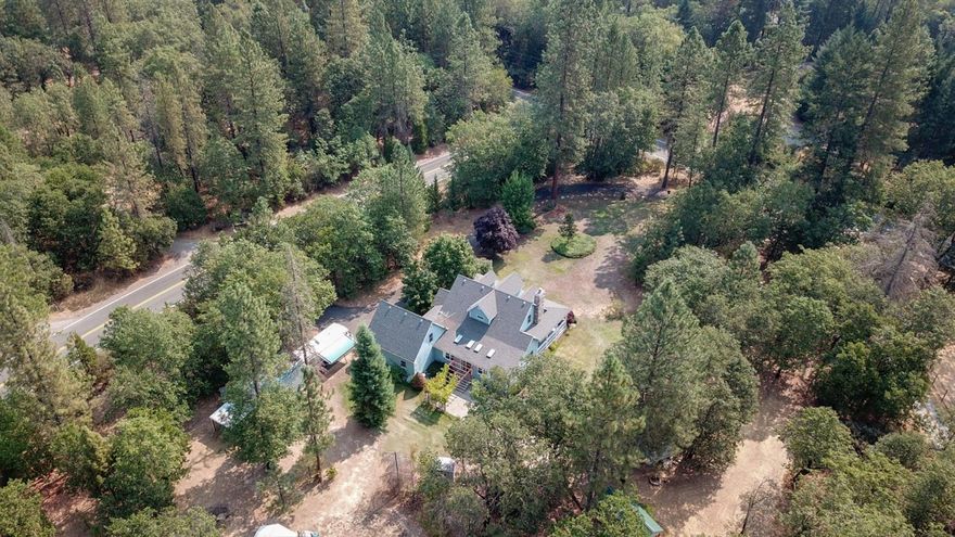 Welcome Home to your picture perfect & move in ready! This beautiful corner lot offers a Colonial/Victorian w/ two story vaulted entry, hardwood floors, fireplace, formal dining, nice lg. kitchen w/ pass thru, lg. family room w/ another bonus/4th bdrm & energy efficient Geo Thermal Heating/Air System. This home can accommodate RV's PLUS all your toys. Two driveways make its entry great for guests & offers plenty of parking for ALL your get togethers. All living on main level, w/ Master Bedroom - two bedrooms & bath upstairs & don't forget on other side of house is the bonus room/4th bedroom. Abundant storage in covered shop, w/ two additional sheds, Gazebo, Large country porches, fenced garden area, Tall Evergreens, sprinkler system w/ room to expand. This is a MUST see, so don't delay, call today as this won't last long! All information deemed accurate but not guaranteed and subject to change at any time!