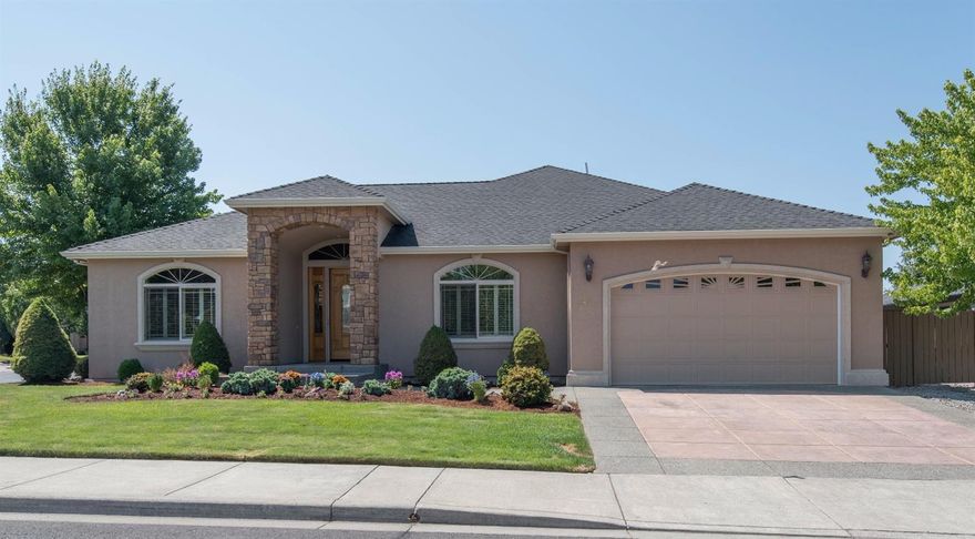 Absolutely beautiful 4 bedroom home in the Eagle Point Golf Community with popular split floor plan. Tall vaulted ceilings in great room for a spacious and light/bright feeling along with a gas fireplace for those cozy evenings... In addition to the walk-in pantry, the open feeling kitchen has two large islands and lots of storage and counter space. Kitchen is open out to the Great Room for inclusion in the activities by the chef. Master suite has private bathroom with large tiled double headed shower w/seat and raised soaking tub along with a very large walk-in closet. There is also a door out of the master bedroom to the covered patio for that morning coffee or an evening soak... Back yard is low maintenance. Side yard would make a HUGE RV parking area with the removal of a couple of small trees... HOA fees are only $65 per quarter. This special property is fresh thruout and ready for your immediate enjoyment.