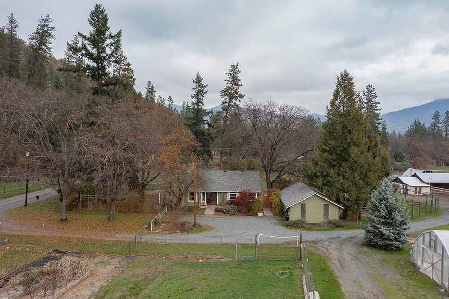 Located in the beautiful Applegate Valley * TWO HOMES on one tax lot! This farm is set up for your agricultural needs. With EFU zoning & IRRIGATION RIGHTS on 21+ acres to Thompson creek which is on the property, 2 reservoirs for upper fields & 8 holding tanks also. This property backs up to BLM land. With added bonus of  3 wells (GPM done on 12/14/20)  & 3 septic's (pumped on 12/12/20) The farmhouse has been updated with new  kitchen floors & appliances with complety fenced in back yard and new deck, great views of the property also. The ADU 2,153 sq. ft. is a custom built straw bale home with a  
 beautiful soap stone stove a very unique design. Would make a great Air B&B or rental has it own separate driveway also with fenced in back yard, great horse property  also features, green houses ,guest cottage, barns, Orchard. Property is fenced with multiple pastures. Close to a lake, rivers, vineyards. PLEASE watch video. So much to see & offer on this property its a MUST see!