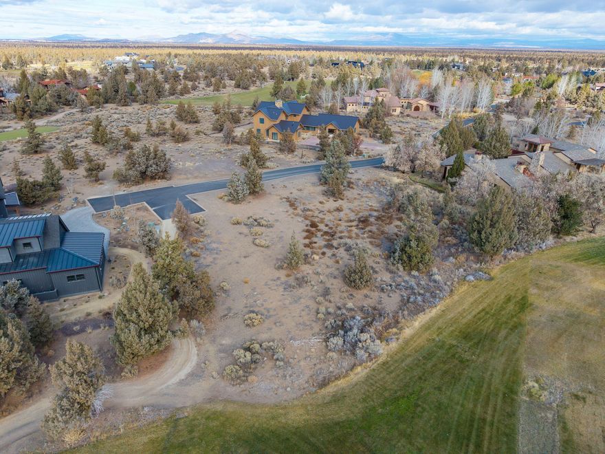 Enjoy the luxury of resort living from this gorgeous, south-facing 1/2 acre lot. Backing up to the driving range you are just minutes away from the clubhouse, trailhead, pool, exercise complex, restaurants, and spa. The Oregon high desert doesn't disappoint here at Pronghorn Resort - Buyer responsible for required membership deposit. Enjoy all the amenities at Juniper Preserve! 36 holes of Championship Golf on the Fazio & Nicklaus courses, Troon golf benefits, Private Members Club, Restaurants, on-site Market, Concierge Services, Day Spa, Pools & Hot tubs, Fitness & Wellness Center, Staffed 24-hour Gate, Pickleball, Dog Park, trails and access to public lands.