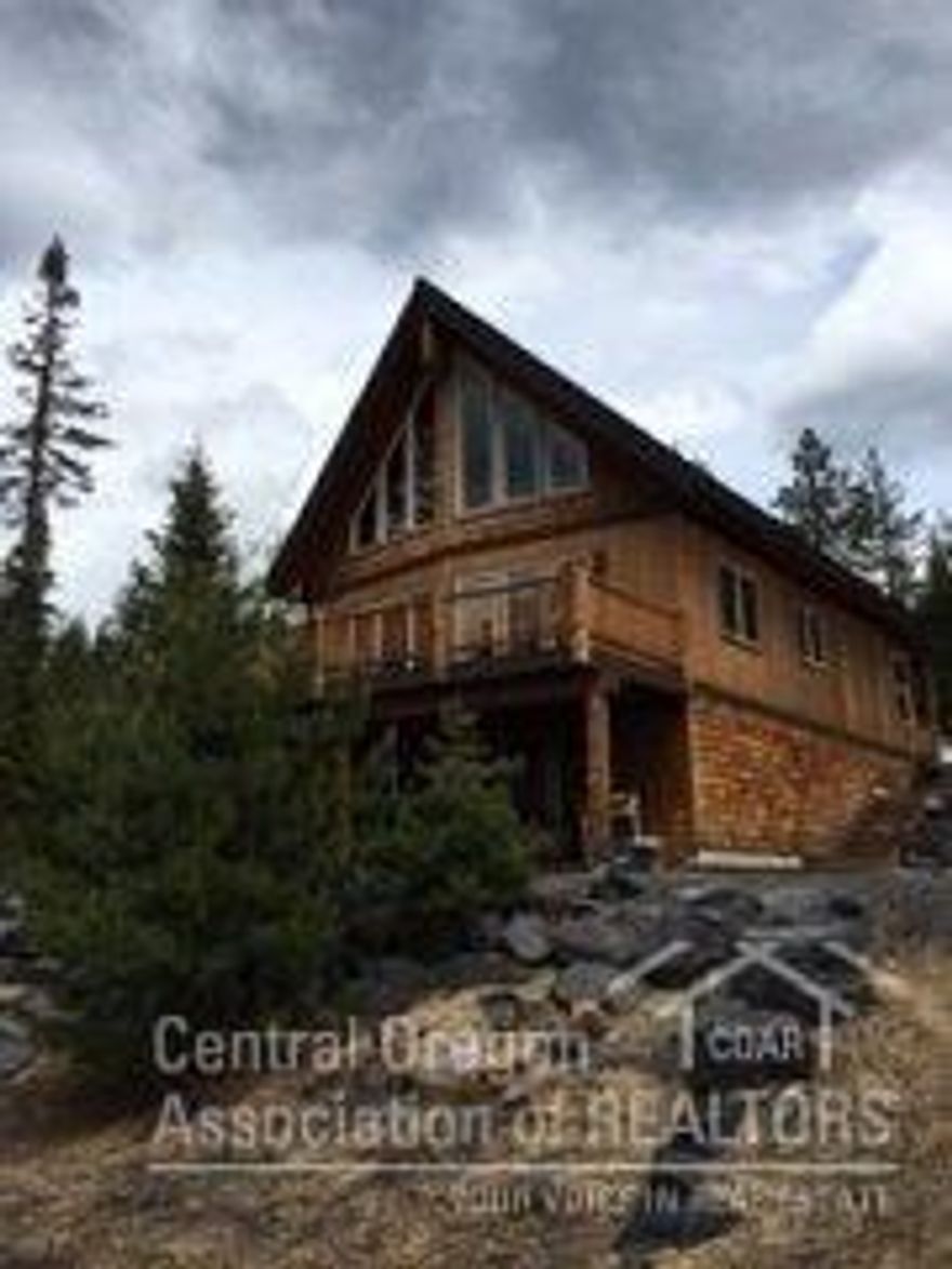 This mountain Chalet has wonderful views of Crescent Lake and the mountains! This home comes fully furnished, just movein and start enjoying this home that features a full basement with family room, game room, and bar. 2 Car garage with drive through garage doors for easy in-out access. Paved driveway. Extra large lot. Streets maintained year round.Close to Willamette Pass Ski