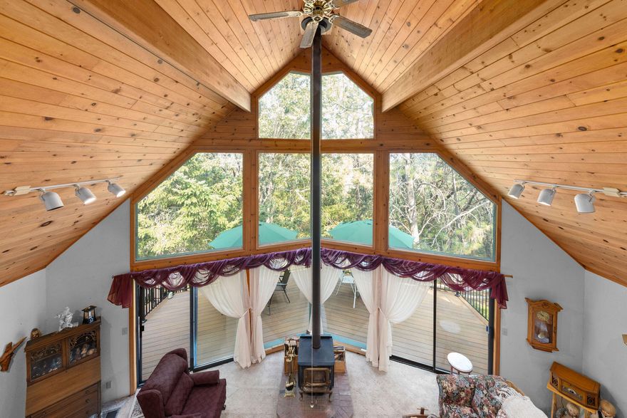 First time ever on the market! This majestic wooded property offers a 3,326 sq. ft. home with 3 bedrooms and 2.5 bathrooms, set on over 7 acres of peaceful, private land. The newly completed $65,000 deck is truly spectacular—ideal for entertaining or simply unwinding in nature.

The main residence includes an attached 2-car garage, PLUS A DETACHED GARAGE/SHOP (1,500 sq feet) and an RV carport with full dump and hookups—plenty of space for all your vehicles, projects, and outdoor toys.

Bordering BLM land, you'll enjoy endless opportunities for hiking, exploring, and immersing yourself in nature right out your back door.

A rare blend of privacy, space, and natural beauty—this is the place you've been waiting for.