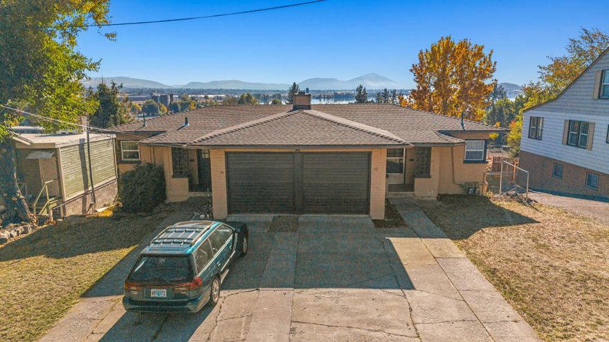 Incredible investment or owner-occupant opportunity! This turn-key duplex is located in the heart of Downtown Klamath Falls and offers beautiful views of Lake Ewauna. Each unit features 2 bedrooms, 1 bathroom, and a spacious bonus room, providing plenty of living space or flexibility for an office, playroom, or guest area. Both sides include an attached garage for convenience and storage.

Enjoy peace of mind with a brand new roof, a large fenced backyard, and units that are exceptionally clean and well maintained. Whether you're looking to live in one side and rent the other or add a strong performer to your portfolio, this property is a rare find combining location, condition, and value.