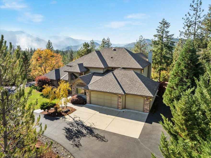 Beautifully manicured private estate.  Gated paved driveway gently winds up the knoll to a majestic 3,503sf home w/2BD and 2.5 BAs. Add'l Ofc & Bonus area could be turned into a 3rd BD-- Septic permit allows for 3BD. Open floor plan w/separate living & dining rooms. Visually pleasing staircase takes you to the 2ndBD, bonus area, full BA & balcony w/majestic mountain & SW facing views! Primary BD has door to covered shared patio, room for LG furniture, primary BA has LG walk-in closet, walk-in tile shower, LG bathtub spa, dual sinks, sep toilet area. 3 car garage. Room for RV pkg/gardening/pets/animals. Property is sloping w/flat areas. Second buildable lot can be sold separately to ensure future privacy. Ask agent for more. Home & property have too much to list here so ask for the Feature/Good-to-Know List & video loaded in MLS! Or if this is being viewed by other websites go to //clients.wcimages (insert dotcom) /596-Bellewood-Dr/idx  to see video and lists. Contact agent today!