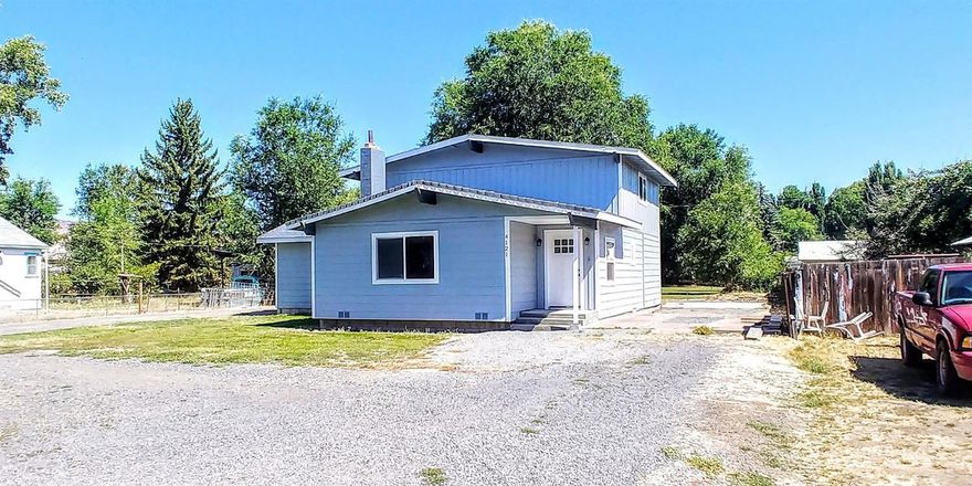 This home is redone top to bottom and is a must see! On a large lot (.57 of an acre) with 3 bedrooms, 2.5 baths and all modern updates inside and out. Updates include; new high end flooring throughout (carpet, tile and laminate), all new fixtures, updated kitchen with new appliances, fresh interior paint, new doors, gorgeous bathrooms with new vanities and beautiful tile work, vinyl windows and new exterior paint. You really will find so much attention to detail on this home that makes it such a unique property. The lot is fenced on the sides and back creating a perfect place for additional storage or even a pasture with animals, so many opportunities! Located in a central suburban area, close to main roads with easy access to Hwy 140, 97 and 39, bus lines close by, schools around the corner and shopping all within walking distance! Its another great home from PoMo Properties and is easy to show, vacant with a lockbox.