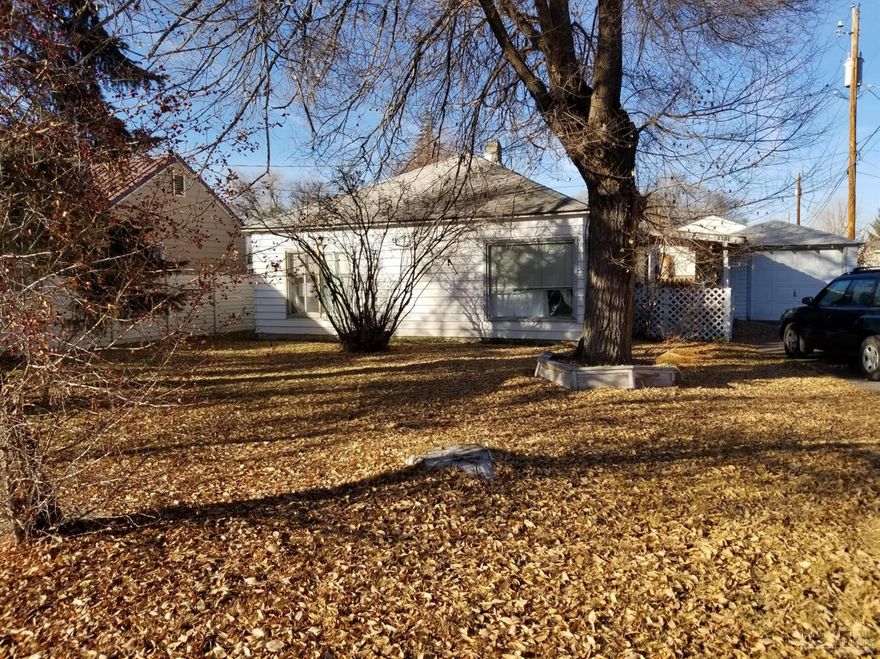 OIder home with 2 bedrooms, living, dining, full bath with additional larrge mud room or could be used for other. Great location with treed lot, single car garage, and a lot with plenty of room.