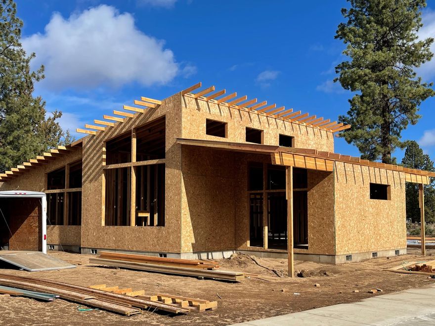 Lot 100 in Discovery West Phase II is being built by award winning JD Neel Construction Inc. This Mid Century Modern home is 2100 sqft single level with 3 bedrooms 2 full bathrooms.  High end appliance package, solid surface quartz countertops throughout. Enjoy efficient living with solar power.  This large lot offers an over sized 2 car garage along with a 38 x 16 sprinter van RV garage.