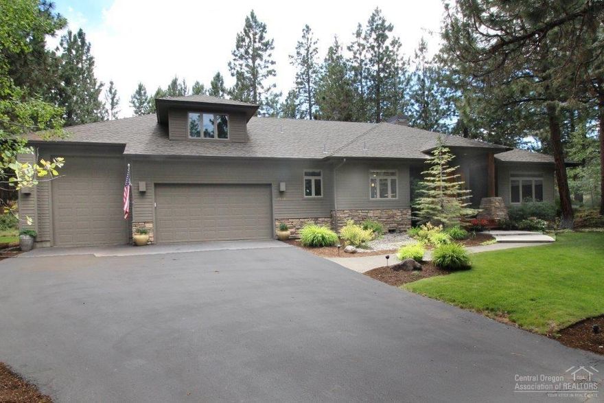 Everything you are looking with the added security of a gated community. Main floor living features 3 bdrms and 2 full baths. Upstairs has a Bonus room and office. So many high quality features; 3/4 hand scribed hrdwd flrs, Slate, Tile, solid Alder doors & cabinets, wood clad windows,lrg mstr bath w/soaker tub & walk in tiled shwr. Amazing private outdoor space w/a gorgeous water feature and fireplace. 12x24 3rd garage bay. This is a premier, end of the culdesac, .70 acre lot, in a top ranked golf community