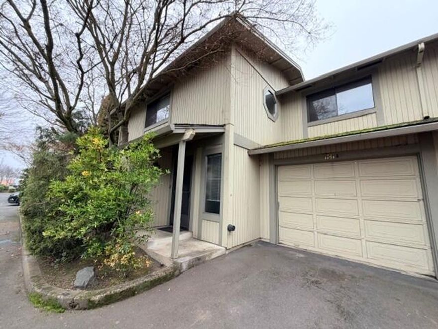 Spacious 3 bedroom, 2.5 bathroom condominium with 1 car garage.  All appliances including washer and dryer included.  Nice rock fireplace in living room and roomy dining room with sliding glass door to covered patio and yard.  All bedrooms are upstairs. HOA features a Pool, Water, Garage, and Sewer.  Home is in good condition, however some updating would brighten it up!