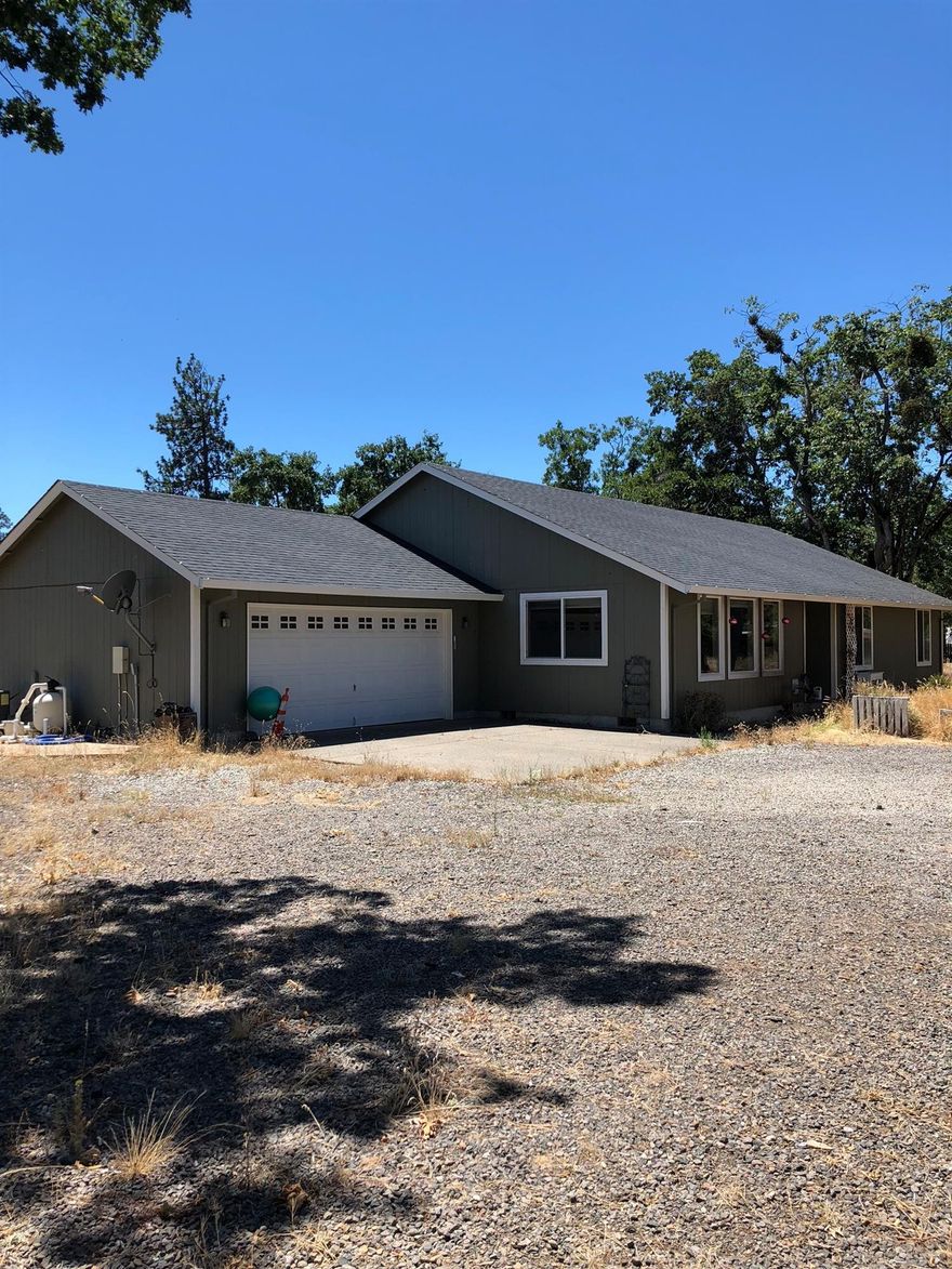 Excellent property in Sams Valley! Built in 2006, this beauty comes complete w/ 1920 sq ft, 4 bedrooms, 2 bathrooms, on 5 very usable acres, a lovely inground pool & a 1300+ sq ft shop with concrete floor, wired for 220. You'll be greeted by a very spacious floor plan, abundant natural light, vaulted ceilings, & a nice open kitchen that's perfect for entertaining. The covered back patio is the perfect place to stay shaded while enjoying the outdoors, and it's already wired for a hot tub to go along with the great pool. Don't miss out on this wonderful home, take a tour today!