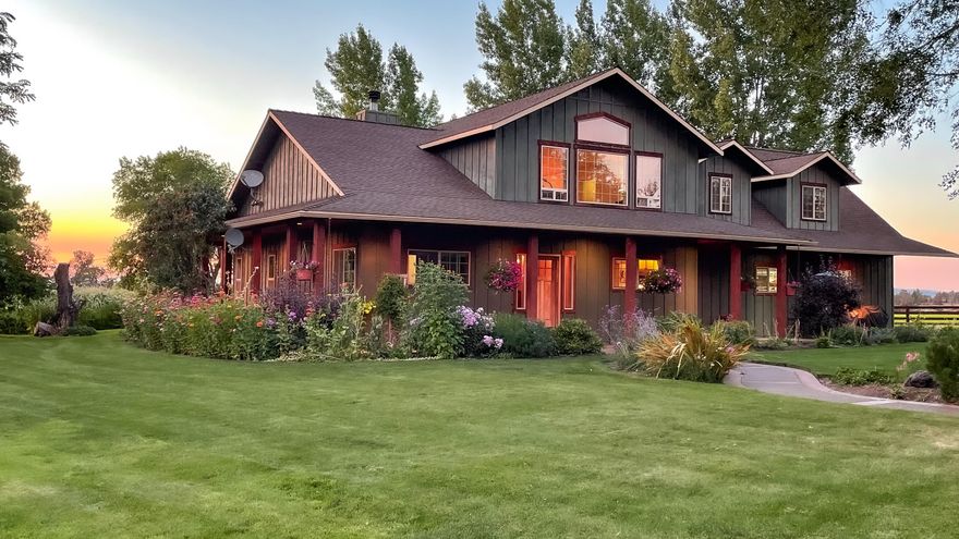 Family held ranch over 4 decades.  80 acres total with Central Oregon Irrigation water rights. Perimeter fenced and divided into hay fields and pastures. Farmstead totals 2 acres enclosed with board fence. Immaculate landscape, fruit trees, shade trees and Cascade mountain views. Main home is 3000 SF custom built in 2004.  There is an adjoining 1700 SF 2004 Fuqua manufactured home, 75' x 40' barn with concrete floor. An adjacent 1000 SF heated garage 2 bays with electric garage door openers. Private well and septic. Front facing pond and additional 3 ponds in pastures. Landscape irrigation system with buried mainline and irrigation pipe serving outlying lawn. Shade trees line the paved driveway. The main house features downstairs great room, entry foyer, kitchen, utility room and primary suite.  Hardwood flooring throughout the main floor, tile in utility and bathrooms. Kitchen has granite counters. Second floor has loft living area, 2 bedrooms and bathroom with tub/shower combo.