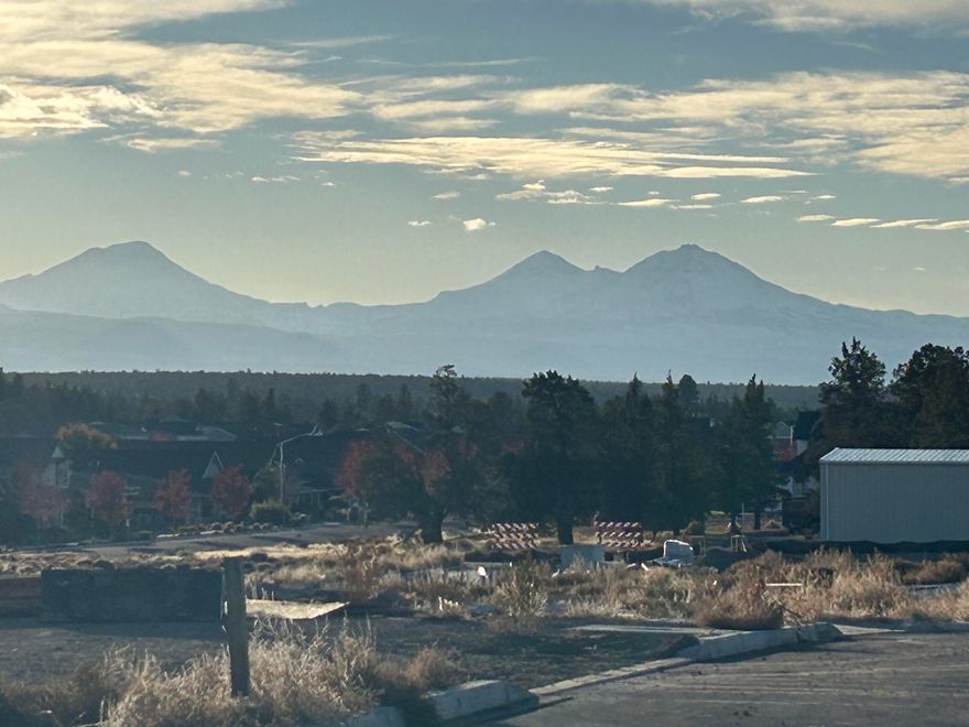 Amazing mountain views on corner lot! Under construction. Lot 48 features the Hamilton w/ open floorplan, vaulted ceilings, 3 bdrms + office/den, 3 car garage & RV parking. 3rd bay has 12' door height to fit recreation vehicles. Upgraded finishes include quartz counters, A/C, tankless water heater, landscaped front & backyard w/ fencing & sprinklers. Primary bdrm features backyard patio access, XL walk-in closet, bath w/ double vanity, tile shower & enclosed toilet. Kitchen complete w/ SS appliances, soft-close cabinets, full-height tile backsplash opening to dining room & great room w/ decorative gas fireplace & 2nd access to backyard patio. Durable laminate plank flooring thru-out w/ carpeted bdrms. Laundry/utility room too. Owen Ridge is a new SW Redmond neighborhood within blocks of coffee shop, gelato, brewery restaurant, schools & short distance to golf, airport, & shopping. Est. completion mid-Jan. Photos of similar floorplan home.*Floorplan & rendering subject to chang