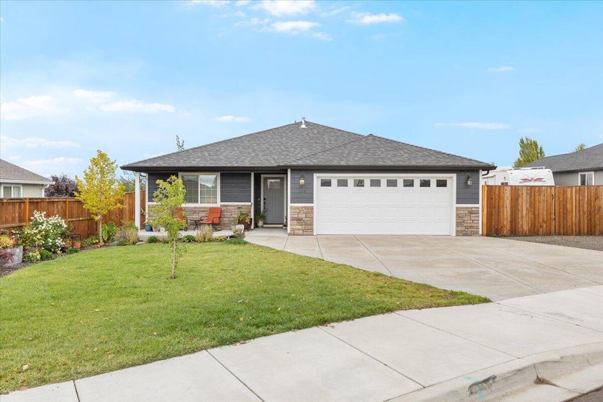 Step into this Beautiful new custom home by Snyder Creek Development! Exceptional craftsmanship and loaded with upgrades, this home offers an open floor plan with a spacious kitchen, granite countertops, custom cabinetry, and upgraded stainless-steel appliances. Primary suite includes dual sinks and a walk-in closet. Features LVP and Carpet throughout, tile flooring in the bathrooms, finished 2-car garage, electrical upgrades, landscaped yard with sprinklers, covered patio, and full fencing. RV Parking is also fenced! Fantastic location close to town and schools. Don't miss your chance to check this out!