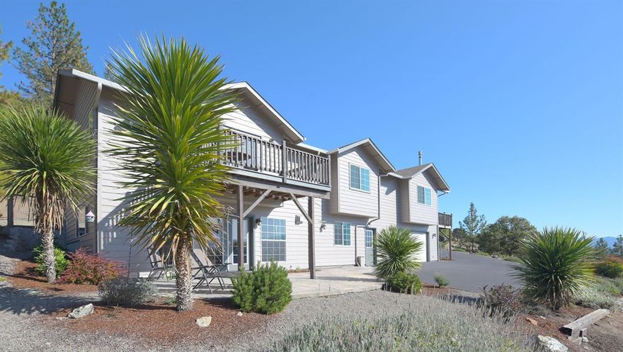 Quality built & immaculate condition, this home shows pride in ownership every step of the way! Includes 720 sq ft detached guest-quarters w/ separate drive, two-car garage & 24x36 garage/shop w/ half bath & 200 amp. The main home has an open & bright floor plan w/ large windows peering upon a serene & striking mountain view only to be truly appreciated in person. The home is complemented with vaulted ceilings & a beautiful kitchen complete with granite counter-tops & tile back-splash. The expansive Master Bedroom includes a gas fireplace, high ceilings & french doors leading out to a private deck. The master ensuite is comprised of a dual vanity set-up, jetted tub and large walk-in shower, & separate his & her walk-in closets! The main floor offers 2 additional bedrooms, full bath, walk-in pantry, & laundry. Downstairs you will find a full bath, game room and 2 additional living areas. Also included is motorhome carport & 20x20 carport for toys. Schedule your private tour today!