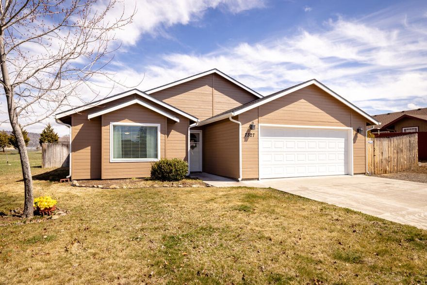 You will not want to miss this darling home in the Sage Meadows subdivision. Offering 3 bedrooms and 2 full bath rooms. This home has great space at 1576 square feet and has recently been painted inside and out as well has having new carpeting installed. The open living room and kitchen lead out to the fully fenced backyard with a great patio and easy up keep landscaping.