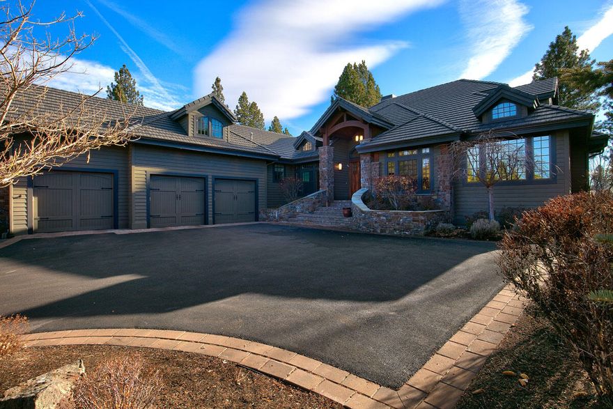 Incredible home in Broken Top on the 13th fairway. Beautiful great room with custom cabinets, big windows and gas fireplace.  Spacious well-appointed gourmet kitchen with custom built in breakfast nook and top of the line appliances.  Equipped with two refrigerators, two dishwashers and plenty of storage. Home features formal dining room, sitting room and all bedrooms on the main level. Bonus room and theatre room located upstairs. Top quality finish work and high end upgrades throughout the home. This home offers a southern exposure and has fabulous Cascade Mountain Views.