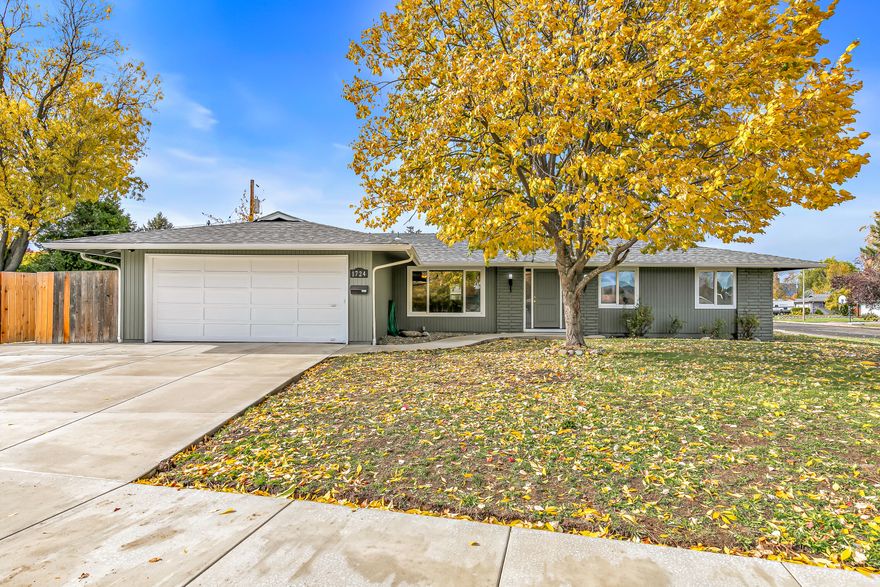 Situated on a quiet dead-end street, this fully updated home offers move-in-ready appeal. Recent upgrades include all-new interior and exterior paint, a brand-new roof, and fresh carpet throughout. The kitchen features granite countertops, while wood flooring flows through the main living areas, creating a warm and welcoming feel. Relax by the fireplace in the living room or enjoy the private backyard with fruit trees and the newly poured concrete patio. The driveway and sidewalks have also been redone with new concrete for a clean, finished look. Conveniently located near parks, schools, and a golf course, this home combines quiet neighborhood living with close proximity to South Medford amenities.