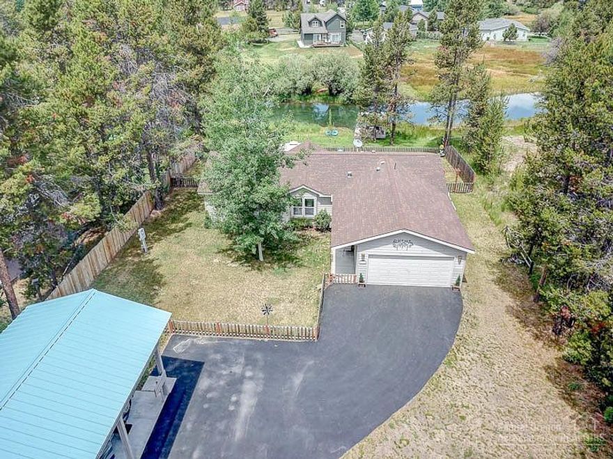 Single Level Home on River Canal with Doc! Well maintained 3Bd/2Ba, 1500+sf home features 90ft of beautiful-quiet-serene river canal frontage & doc + boat slip, extensive asphalt paved driveway, great room, open dining/kitchen w/wood-lam floor, island/B-Bar, tile surround & back-splash, master suite separation from other rooms w/sitting area, walk-in closet, dbl vanity, laundry/mud room, big back deck w/gazebo & great views of water, attached 2-car garage + 36' RV cover w/slab & multiple full-RV hook ups!