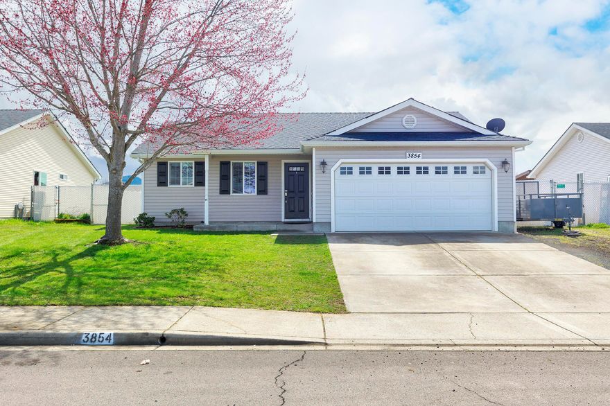 This is it! Modern updated 3 bedroom 2 bathroom home with split bedroom floor-plan w/ laminate flooring throughout most of home. Featuring a spacious fully fenced backyard with shop, access for small to medium RV parking w/ water & electrical hookups. Covered entry greets you into a beautifully renovated kitchen w/ quartz counters, tile back splash, deep sink, stainless steel appliances & custom built detachable kitchen table adding additional counter space or eating area. Living room with vaulted ceilings w/ fan & french doors leading to your back patio great for entertaining. Primary bedroom with walk-in closet, en-suite bathroom w/ tile floors & walk-in shower. Two additional bedrooms & guest bath set off living room. Bedrooms including custom built-in storage with dresser & shoe shelves, Guest bathroom w/ granite counter, tile floors & tub/shower. All this w/ easy access to Hwy-62 & close proximity to Medford, shopping, restaurants, medical & more. Call to schedule your tour today!