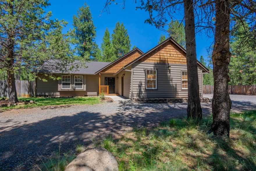 Enjoy the quiet and serenity combined with the convenience of close proximity to Sunriver in this charming single level home. This desirable acre property is situated on a corner lot with a fenced in yard, shaded by mature pine trees, and spacious deck make this property perfect for a year round residence or weekend/summer getaway! Enjoy a private boat launch just blocks away. 20 minutes to Mt. Bachelor and 30 minutes to downtown Bend, this property truly offers the very best of an authentic Oregon lifestyle!