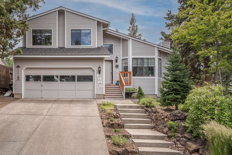 Welcome home to this wonderful property situated on a large, quiet corner lot.  This split-level home offers an abundance of natural light with the newly added living room skylight and lots of room to move around.  Updated kitchen and bathrooms, custom blinds, newer washer and dryer and stainless steel appliances provide convenience and reliability.  The downstairs bonus living area is a great flex space with tons of potential.  Outside, you will find a generous sized private backyard, complete with great decking accessible from the kitchen and primary bedroom, multiple small outbuildings, a variety of fruit trees including a robust cherry tree, mint, plum and blueberries anf a 20x30 space with power, water and street access, perfect for a boat or RV.  Close to parks and schools yet just off the beaten path of busy roads make this gem a must see.