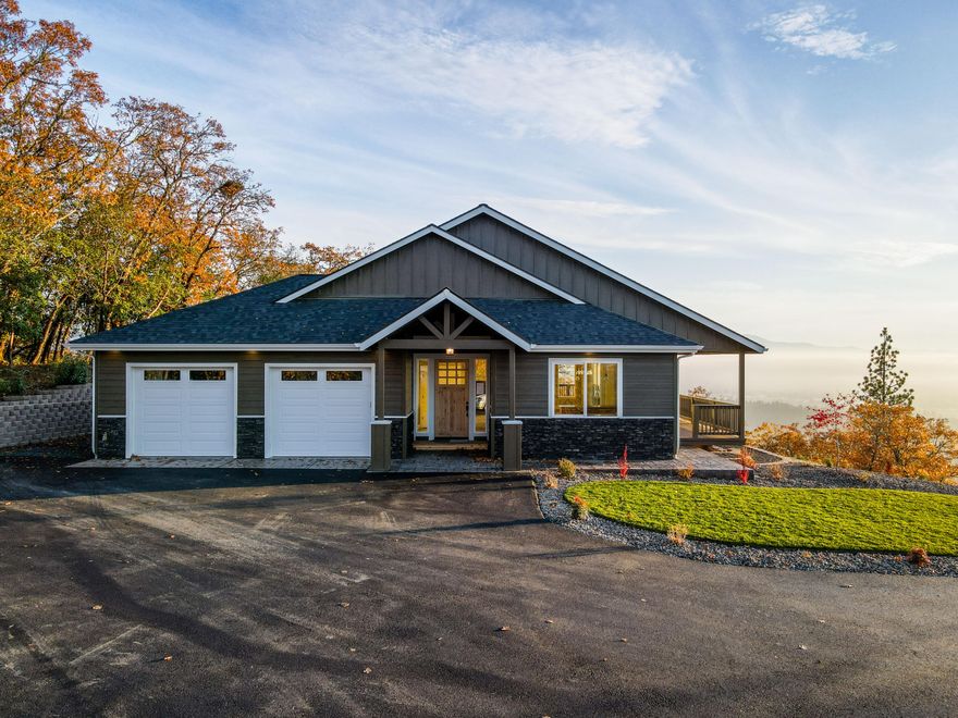See if you can buy this home for 5.5% interest! Welcome to 149 McKenzie Ridge Road, a tastefully designed BRAND NEW home with one of the best views in town. This home is wonderfully laid out with an open and airy floor plan to enjoy the spectacular views. This home features: 2,464 SF with 3 bedrooms, 2 bathrooms with ample windows, and a spacious, covered deck for enjoying the Southern Oregon sunsets. This home is well finished with high end cabinetry, granite counters, upgraded flooring, and beautiful tile finishes. Seamlessly entertain both inside and out with the large, covered deck and sliding doors. The driveway will be paved and landscaping is to be added soon so you won't have to lift a finger! Come see for yourself this beautiful home in a fantastic, gated community. Call for your tour today!