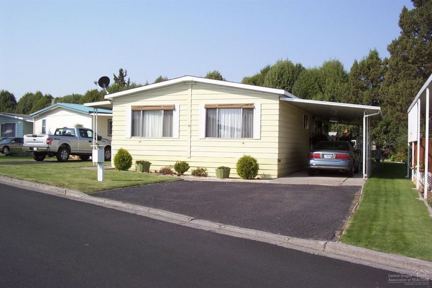 At one of the most desired! Green Pastures Senior Co-op Mobile Home Park in Redmond is this super nice 2/2 bedrms/baths 1344 sq ft home. Upgraded interior includes laminated flooring, kitchen cabinets, counter tops, bathrooms, interior paint and a new Heat Pump heating system. Large covered carport and you have a voice/vote as a co-op park owner.