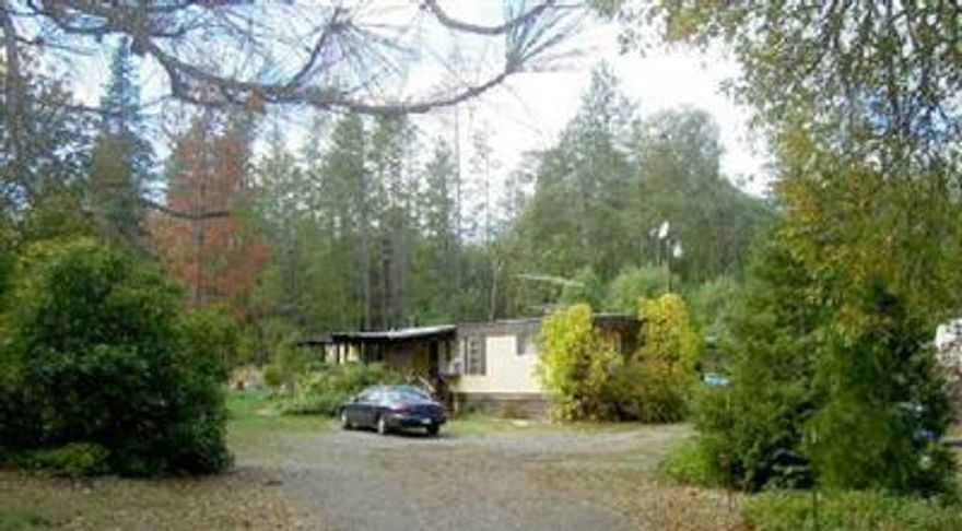 Wonderful Country Setting. 1975 Singlewide W/Add-ons. 4.08 Level Acres W/Mature Landscaping & Open Areas For Garden Or Animals. Has A Very Good Well And Septic Per Owner & Records.