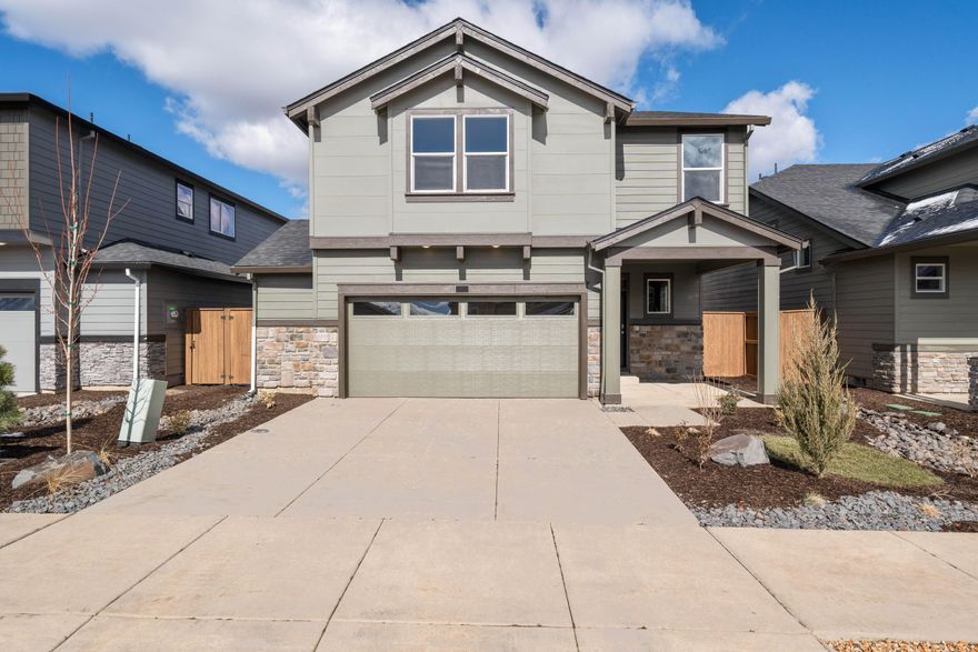 Red Tag Sales Event Happening Now! SPECIAL INTEREST RATE PROMO and CLOSING COST CREDIT with the builder's preferred lender. New construction in Bend! Experience Stevens Ranch in Bend situated next to Reed Market Rd and Highway 20 with easy access to the outdoors and city amenities. This roomy Pacific two-story floor plan has 4 bedrooms plus a bonus room, 2.5 bathrooms, and a den on the main floor that is perfect for guest stays or an at-home office. The open concept living space has stunning modern finishes throughout with wood-grain laminate flooring and has designer touches like a fireplace. The chef-inspired kitchen has outstanding features like stainless-steel appliances, quartz countertops with full tile backsplash, and a gas range/oven. The primary has wonderful features including a double vanity sink, walk-in shower, and a spacious walk-in closet. Call for details. Sales office hours are 10am - 5:30pm daily. Photos are representative of plan, features/specs may vary!