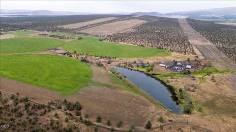 Photo of 7995 SW Houston Lake Road, Powell Butte, OR 97753 (MLS # 220223053)