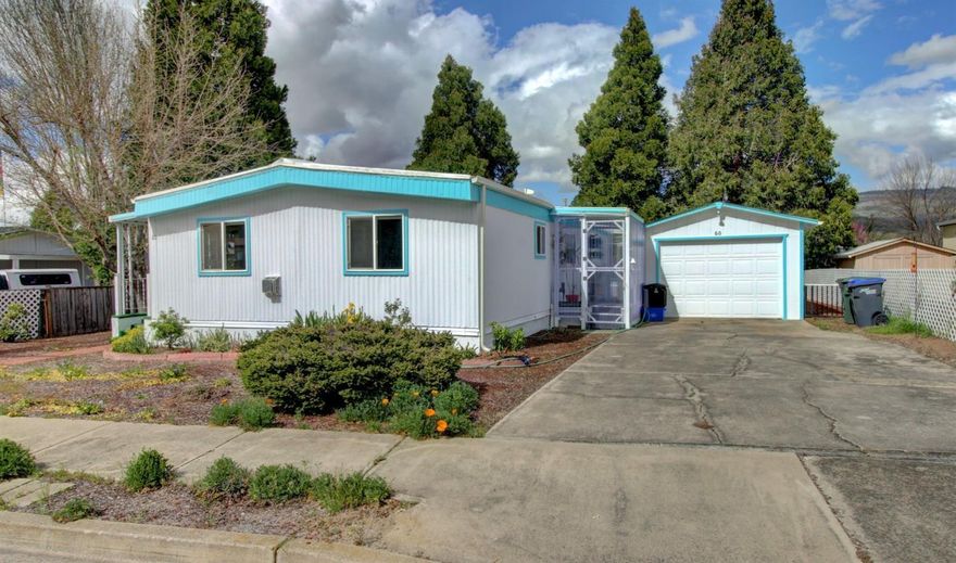 Light, bright and airy are just a few of the delights you'll notice about this home! Tucked back against stunning views in gorgeous Talent, Oregon you'll discover a gardener's delight complete with a finished an insulated workshop, hobby room and a detached garage with built-in cabinets, and a work bench. Surrounded by garden beds, paths and paver walkways, you'll almost feel like you're in a country garden! Inside pride of ownership shines with fresh paint, newer carpet & vinyl flooring, and newer laminate countertops! This home boasts several recent updates and upgrades, and is ready to be called your new home!