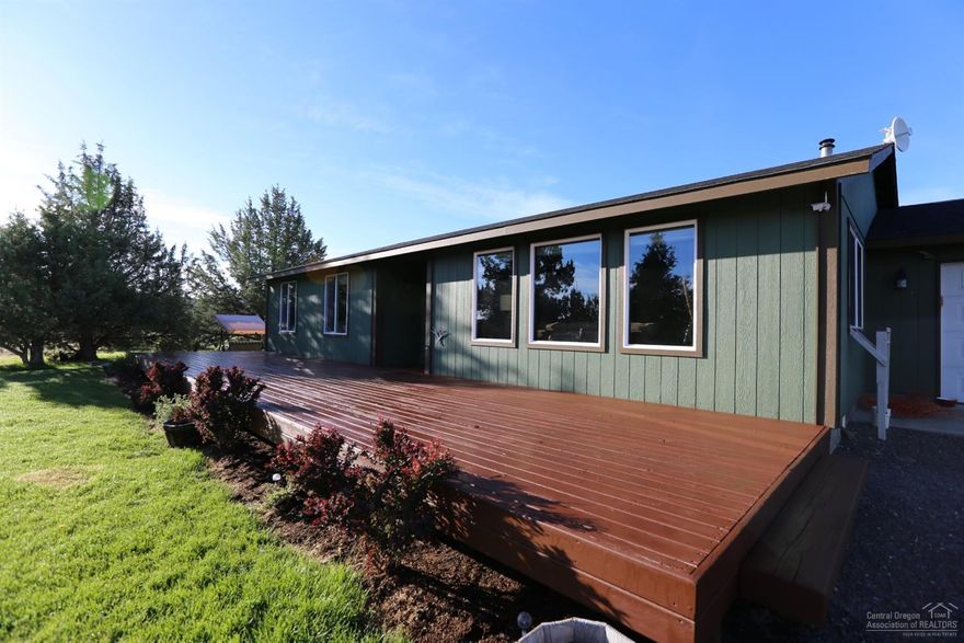 A diamond in the quiet and desirable Prineville Lake Acres - 2! This immaculately upgraded and maintained 1702 SF 3 bed/2 bath main level home rests upon 1.87 acres of a Yuma (to be paved in June) with direct access to over 75,000 acres of Millican BLM Land - great trail riding for horses and ATVs. Enjoy the vaulted ceilings and wood stove in the bright and airy living room complimented by tasteful flooring. Open kitchen features pantry & wood cabinetry. Entertain guests from the epic pergola extended rear patio & fire pit while enjoying spectacular Central Oregon sunsets. Don't miss amazing shop & custom chicken coop!