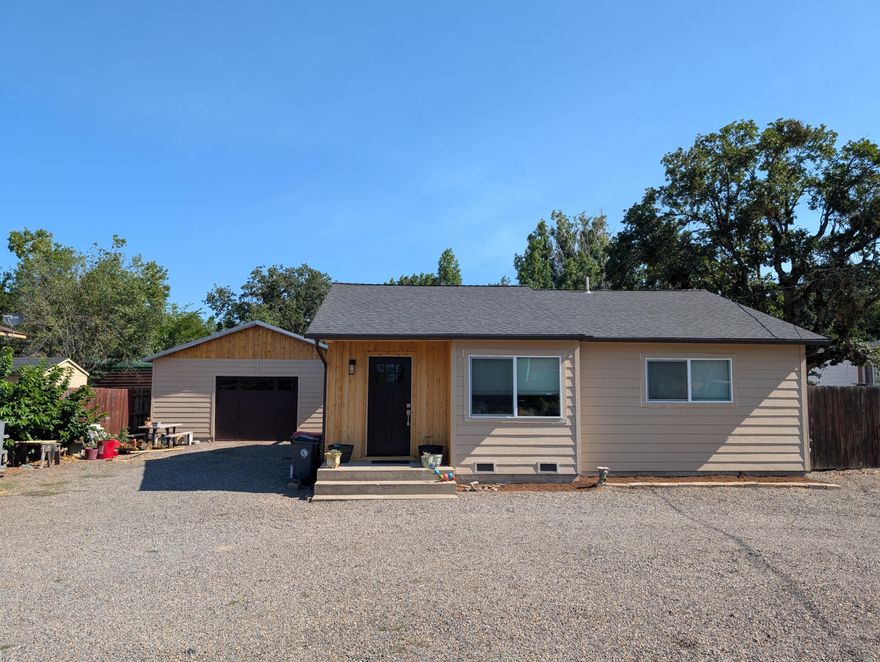 Central Point home sits in the country but only minutes away from city limits. This 1,050 sq.ft. home features 2 large bedrooms and 1 remodeled bathroom sits on .41 of an acre which has irrigation rights. Huge 30x50 shop as well as covered RV parking and more. Inside you will find hardwood floors and a large living room. The kitchen has plenty of cabinets and counter space and has been remodeled within the last two years and boasts Corian counters. New Lennox HVAC system as well as a new roof in 2022. Home is being painted in July.