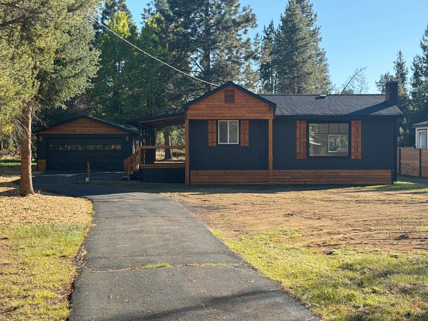 This home is located on .46 acre lot with community sewer and water, paved roads with access to the Big Deschutes River and marina. 40 acres of National Forest that boarders the Big Deschutes river for access to fish and enjoy the river. This 1970 manufactured home has been completely remodeled with a new composition roof, new floors, new kitchen cabinets, new counter tops, new lights, new bathroom and tub/shower. New drywall and paint, new windows, new mini split heating and cooling system, Large covered deck and rails, New paver patio. Plus there is a detached 2 car garage with asphalt driveway. This is a must see property.