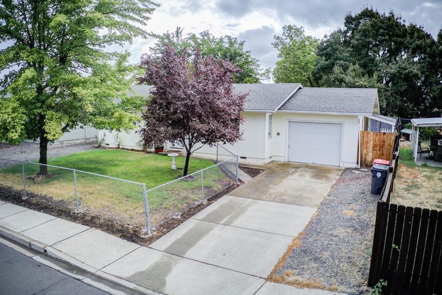 Fantastic home in White City!! This home shows pride of ownership with new laminate floors in both spacious bedrooms & has an abundance of natural light throughout the house! There is a Bonus room added without permits and is great for an office, playroom, etc. The kitchen has lots of cupboard space, great appliances & opens to the living room!! It is situated near Table Rock Elementary school, Library & city parks. The back patio is great for entertaining guests with the built-in fire pit. This home is cute! Call and schedule your tour today!