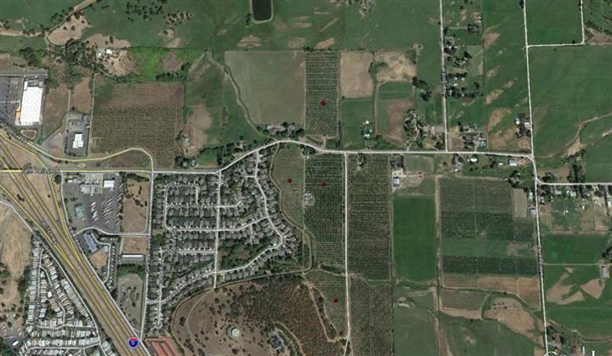 Total of approx. 87.52 acres of agricultural and available in the Phoenix area. Former pear orchard. Two existing residences and a variety of other sheds/buildings. Approx. 80.70 irrigated acres serviced by TID. A total of 9 tax lots which can be sold in various sizes/configurations - Call broker for property & price breakdowns.