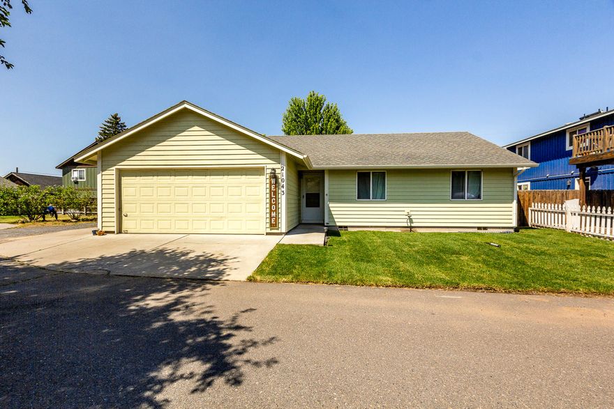 A fantastic opportunity to affordably own in Bend! Wonderful View of Pilot Butte and close to shopping on the East side of Bend!  This darling home has a great room floor plan, vaulted ceiling and has been updated with new wood laminate flooring, appliances, newly painted kitchen cabinets and just got a new micro split heating system in 2019! Double car garage and low maintenance landscaping! This home is ready for you to enjoy!