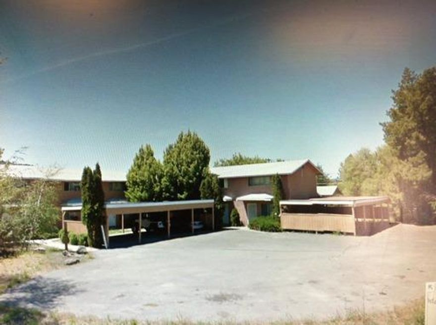 AS-IS price for quick closing. Two 4 plexes located close to the lake, College and Hospital. Town house style. Kitchen, dining area, half bath and living room downstairs. 2 bedrooms and full bath upstairs. Carports and patio areas. Three tax lots. Great rental history. 5 vacant. Needs work. Call for financials.