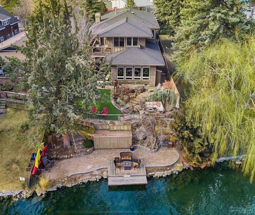 The best of both worlds in downtown Bend. Urban in the front, oasis in the back! The second you walk thru the front door, the river greets you! This property truly has one of the best downtown riverfront lots in Bend with grandfathered dock and riverfront improvements. <div>You will love the spacious open floor plan with large central open kitchen, family room with a wall of windows facing the river. Upstairs has 3 large bedrooms, and approx 500 SF bonus room. Fireplaces in living room, family room, bonus room and master bedroom. Home was updated in 2017 with new kitchen and bathroom counter tops, carpet, refinished wood floors and all new appliances. This property also has a transferable grandfathered STR Permit in place. Rental history numbers available. Upcoming transformation of Shell station lot will benefit our portion of Harmon Blvd.</div><div><br></div><div><br></div>