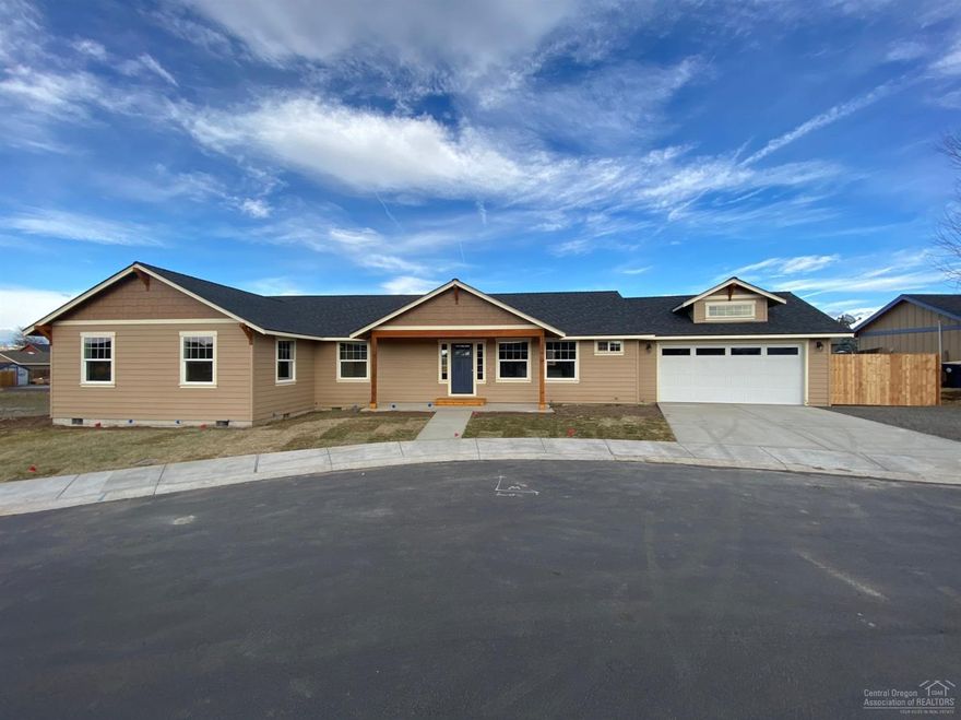 Home is a must see! Beautiful new single story home by award winning builder with a huge open great room floor plan in a desirable NW location blocks from; schools, shopping, park, dining, & canyon access! Large lot w/huge fenced rear area that just needs your personal landscaping touches. Home features; Fenced RV parking, Gas FP w/TV nook, SS Appliances, soft close drawers, ample storage with modern painted white cabinets w/granite slab counter tops & tile backsplash, beautiful laminate wood flooring, updated solid wood trim & doors, vaulted great room & master, lots of windows that provide natural lighting, recessed can lighting, tiled entry/bathrooms/& utility room, double vanity in master & large walk in closet, efficient gas furnace, large covered front patio, & rear patio is stubbed for gas bbq!