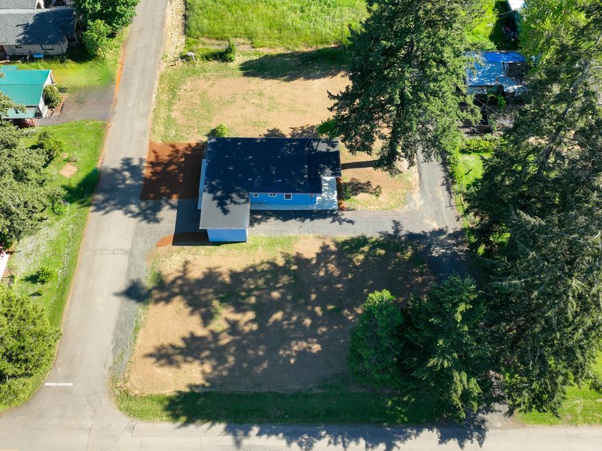 Level corner lot- ready for development! Utilities available at street. Zoning allows for frame built or manufactured homes. Beautiful setting w/mountain views & gorgeous sunsets. Conveniently located less than 30 mins. drive to Roseburg or Cottage Grove & just 1 hr. from the Oregon Coast! Short-term owner carry offers will be considered. Listing broker is related to seller.