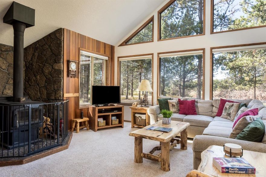 It's all about the LOCATION! Seldom does a home in this part of Sunriver become available. This GEM has been owned by this seller for the past 27 years. Private setting & distant views of the Pond and 3rd hole of the Meadows Golf Course this location is AMAZING! Enjoy the sunset & wildlife from the large wrap around deck w/ built in bench seating. Private enclosed hot tub can be enjoyed after a fun day of outdoor activities. The covered front porch opens into a great room w/ vaulted ceiling & a wall of windows. Wood stove to warm those cool evenings. Granite counters in the kitchen & bathrooms. The kitchen comes well stocked for all your entertainment needs. Two Bedrooms on ground level w/ a guest bath. Upstairs is a large master suite loft w/ outdoor balcony & large walk in closet. Great attic storage off the master. Roof new 2015. A/C new in 2016. Ext painted & decks sanded & stained Oct 2019. SHARC Paid! Single car garage. Furnished & ready to begin your Sunriver memories!