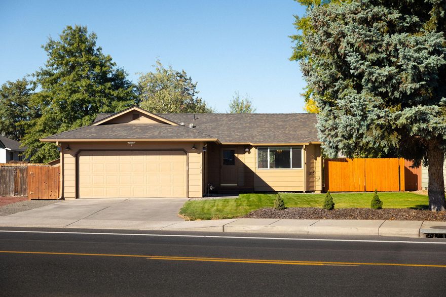 Discover this charming turn-key home, boasting a beautifully landscaped front and back yard that provides a serene outdoor retreat. In the fully fenced backyard, with a shed, are raised veggie beds, blueberry bushes, artichokes, an apple tree and rock pad for a greenhouse. An extensive improvement list includes a new roof, fresh exterior paint, and a refinished deck in 2023. Step inside to find a spacious great room with vaulted ceilings, new stainless appliances perfect for entertaining or relaxing. This home features two cozy bedrooms and two full bathrooms, offering comfort and convenience. Located in a prime area, this property combines easy maintenance with an ideal location, making it the perfect place to call home.