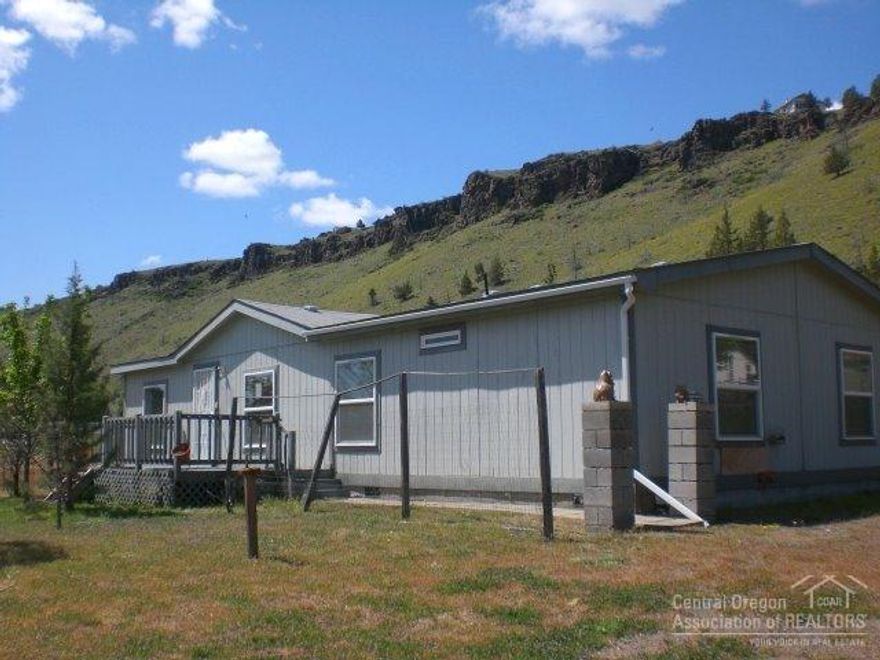 Plenty of peace and quiet to be found at this property located close to the CRR amenities with incredible rim rock and canyon wall views. This double wide 3 bedroom, 2 bath home has vaulted ceilings, a large master suite with soaking tub, a large kitchen, front and rear decks and even a storage shed! Call your favorite agent today to see this fantastic home!