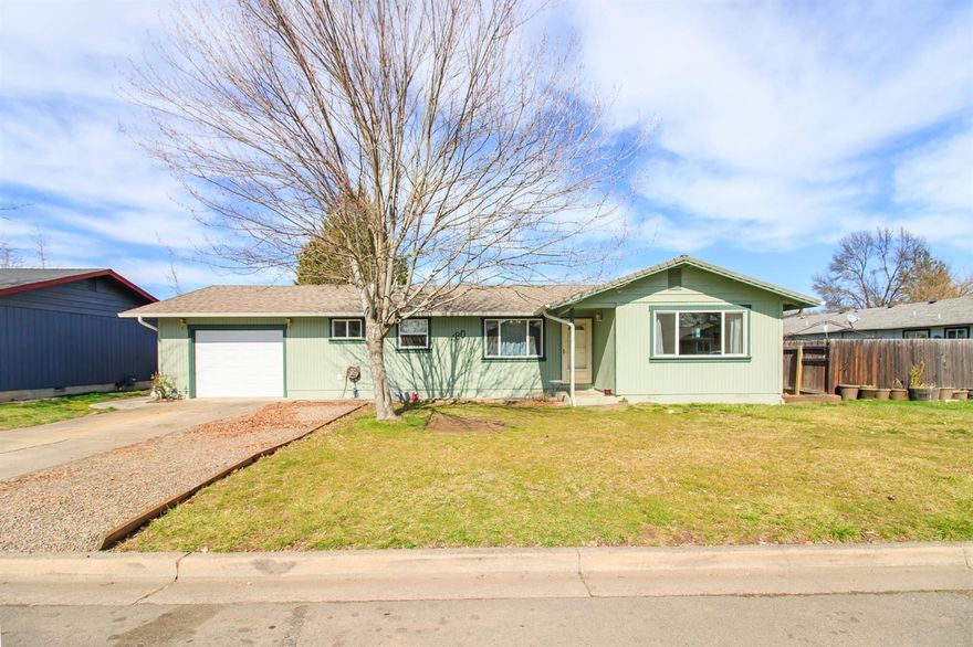 This great buy sits in a nice neighborhood with 3 bedrooms, 1 1/2 baths with garage and should take any kind of financing. The backyard is really large and you would have great RV parking if you put a gate in the fence for access. Underground sprinklers front and back. Better hurry on this outstanding home! Whether you are looking for first time home or rental, you will like what you see.