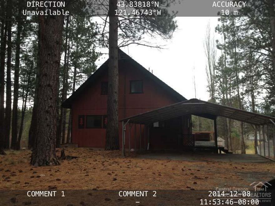 Move in ready describes this quaint home located next to a small river. Large open kitchen with plenty of cabinet and counter space, huge vaulted wood panel ceiling, upstairs loft and 2nd bedroom and bathroom. Railed deck for enjoying those summer days and nights.