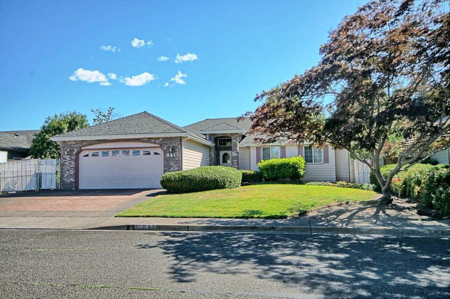 Welcoming home in Jackson Creek Estates offering both comfort & functionality. Open-beam, vaulted ceilings & an airy open floor plan creates a light & spacious ambiance. From the brick pillar entryway to the cozy gas fireplace insert, every detail adds to the home's inviting charm. Large living room features French doors opening to a covered patio & a fully fenced backyard. Enjoy the trellised bench, productive pear tree & low-maintenance raised garden beds. The thoughtfully designed kitchen includes an island for extra workspace & overlooks the open dining area, all beneath exposed beam ceilings. Convenient laundry room provides direct access to the finished garage, making unloading groceries a breeze. Wide hallway to primary suite w/ multiple closets, patio access & en-suite bath w/ double sinks, soaking tub & walk-in shower. Other beds feature lit closets & share a bath w/ tub/shower combo. With dedicated RV or toy parking & other features, this home blends practicality w/ comfort.