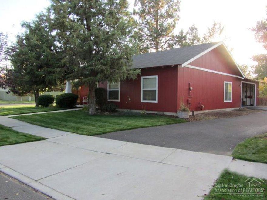 This home is light, bright with an open floor plan. The great room has laminate wood look floors, vaulted ceiling, gas fireplace. The kitchen island makes it easy to entertain. Check out the extra large pantry & utility room. The flexible 3rd bedroom could be a great office if you work from home. Door off the kitchen leads to the fenced back yard with lush lawns and mature trees for a nice private feel. Home recently painted outside, garage is oversized for extra storage. Extra parking beside garage.